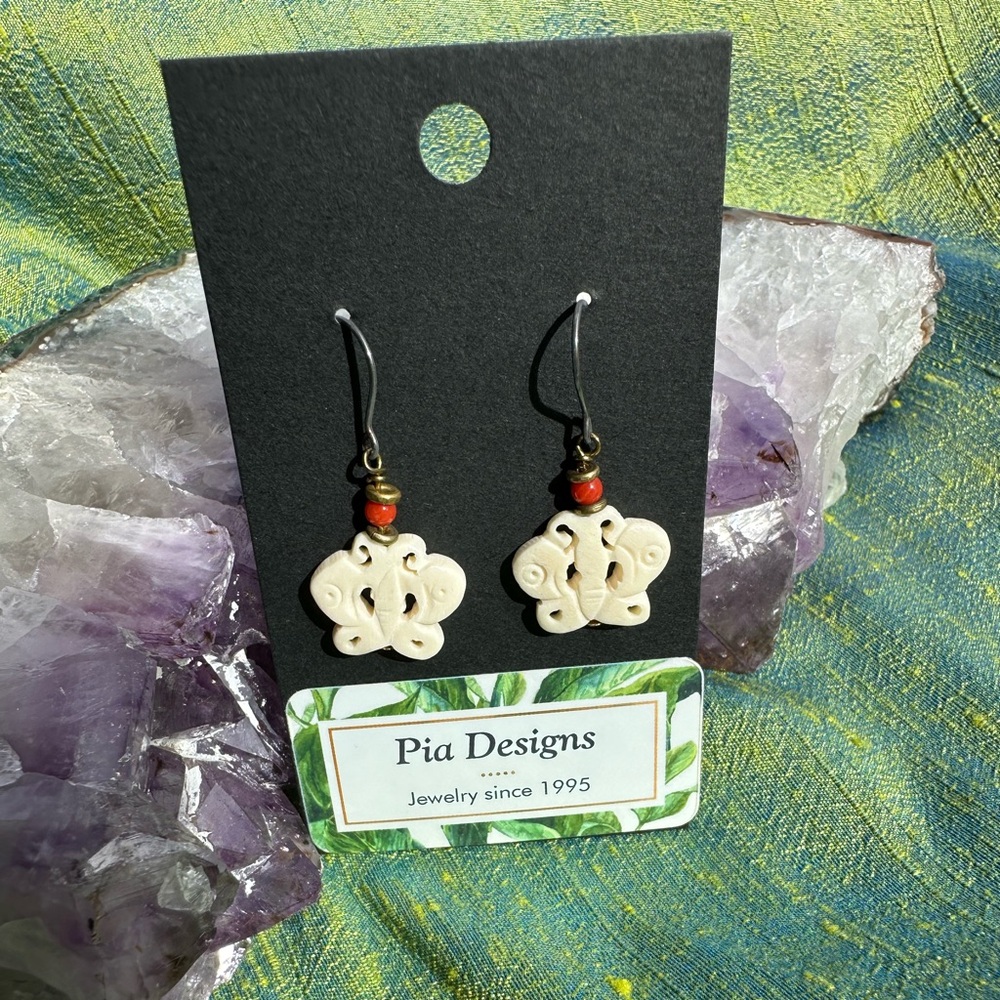 New Hand Crafted Butterfly Earrings with Coral accent beads.